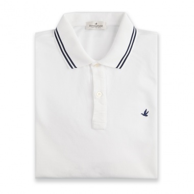 Polo blanco ribete azul marino
