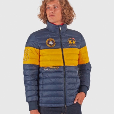 Cazadora acolchada azul y amarillo