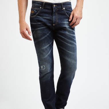 Pantalón vaquero desgastado