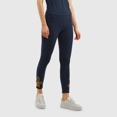 Pantalón azul logotipo dorado